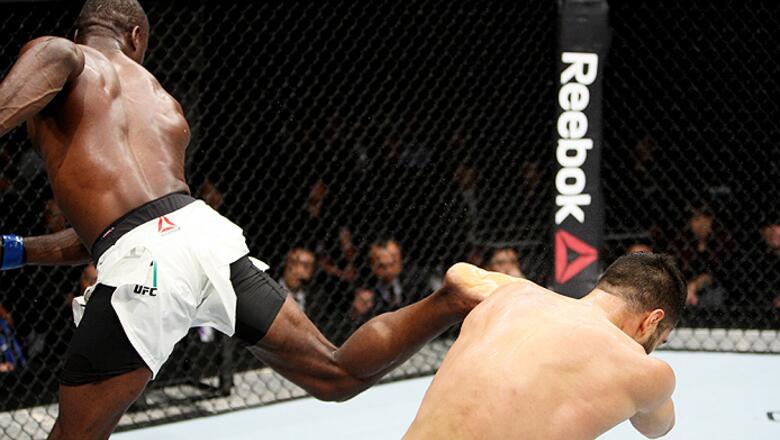 SAITAMA, JAPAN - SEPTEMBER 27: Uriah Hall of Jamaica lands a back kick to drop his opponent, Gegard Mousaasi of Iran in their middleweight bout during the UFC event at the Saitama Super Arena on September 27, 2015 in Saitama, Japan. (Photo by Mitch Viquez