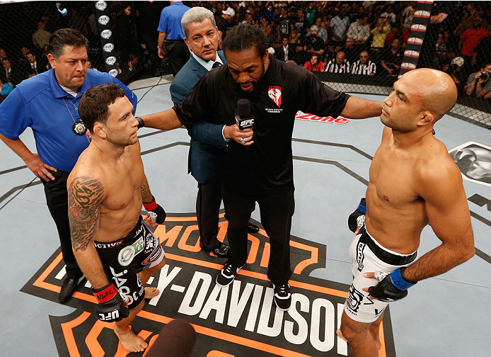 LAS VEGAS, NV - JULY 06: Referee Herb Dean (center) explains the rules to (L-R) Frankie Edgar and BJ Penn in their featherweight fight during the Ultimate Fighter Finale inside the Mandalay Bay Events Center on July 6, 2014 in Las Vegas, Nevada. (Photo