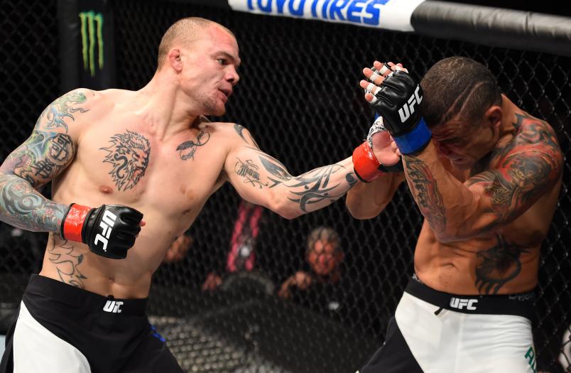 PITTSBURGH, PA - FEBRUARY 21: (L-R) Anthony Smith punches Leonardo Augusto Leleco in their middleweight bout during the UFC Fight Night event at Consol Energy Center on February 21, 2016 in Pittsburgh, Pennsylvania. (Photo by Jeff Bottari/Zuffa LLC via Getty Images)