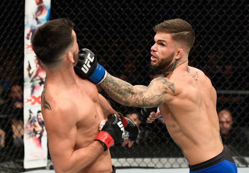 Cody Garbrandt throws a punch at Dominick Cruz in their UFC bantamweight championship bout during the UFC 207 event at T-Mobile Arena on December 30, 2016 in Las Vegas, Nevada.