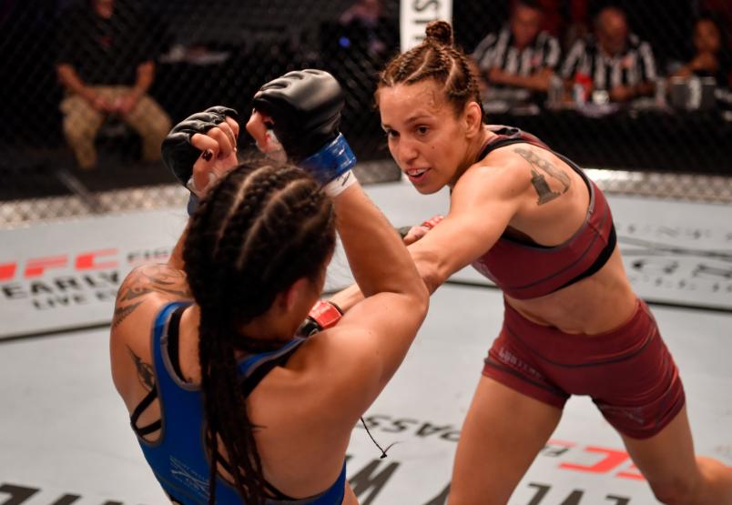 LAS VEGAS, NV - JUNE 26: (R-L) Antonina Shevchenko of Kyrgyzstan punches Jaimee Nievera in their women's flyweight bout during Dana White's Tuesday Night Contender Series at the TUF Gym on June 26, 2018 in Las Vegas, Nevada. (Photo by Jeff Bottari/DWTNCS LLC)
