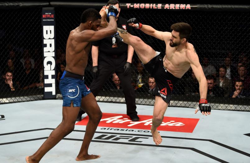 LAS VEGAS, NV - DECEMBER 30: (L-R) Neil Magny catches a kick of Carlos Condit and attempts a takedown in their welterweight bout during the UFC 219 event inside T-Mobile Arena on December 30, 2017 in Las Vegas, Nevada. (Photo by Jeff Bottari/Zuffa LLC/Zuffa LLC via Getty Images)