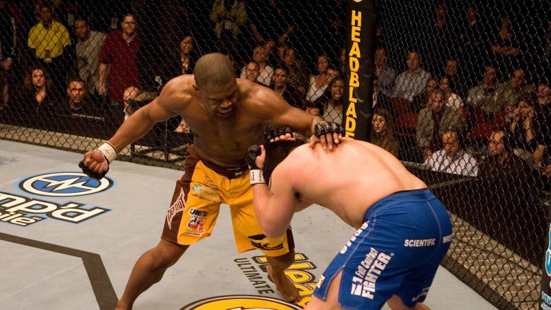 HOLLYWOOD, FL - JANUARY 25: Rashad Evans (yellow shorts) def. Sean Salmon (blue shorts) - KO - 1:06 round 2 during UFC Fight Night 08 at the Hard Rock Live - Seminole Hard Rock Hotel & Casino on January 25, 2007 in Hollywood, Florida. (Photo by Josh Hedges/Zuffa LLC via Getty Images)
