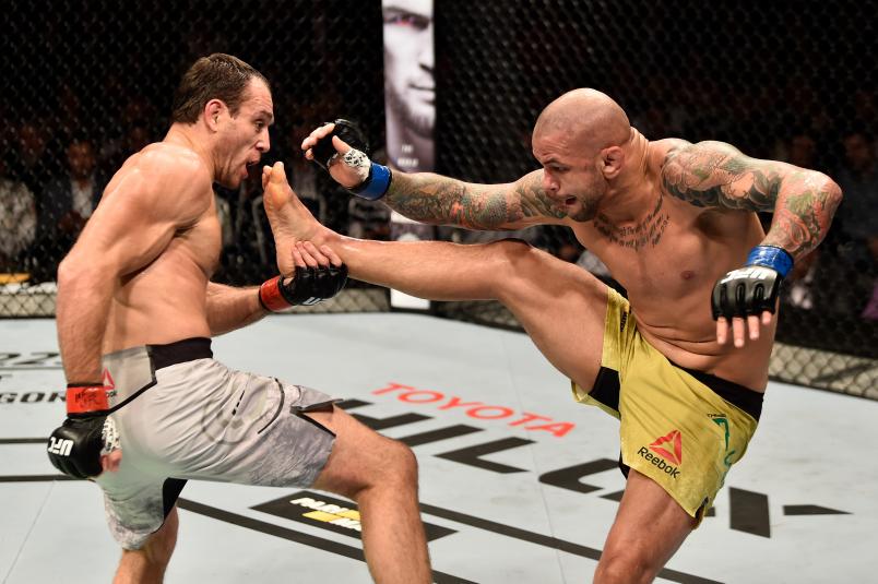 MOSCOW, RUSSIA - SEPTEMBER 15: (L-R) Alexey Kunchenko of Russia catches the kick of Thiago Alves of Brazil in their welterweight bout during the UFC Fight Night event at Olimpiysky Arena on September 15, 2018 in Moscow, Russia. (Photo by Jeff Bottari/Zuffa LLC/Zuffa LLC via Getty Images)
