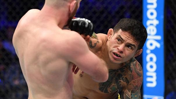 TORONTO, CANADA - DECEMBER 08: (R-L) Diego Ferreira of Brazil punches Kyle Nelson of Canada in their lightweight fight during the UFC 231 event at Scotiabank Arena on December 8, 2018 in Toronto, Canada. (Photo by Josh Hedges/Zuffa LLC/Zuffa LLC via Getty Images)