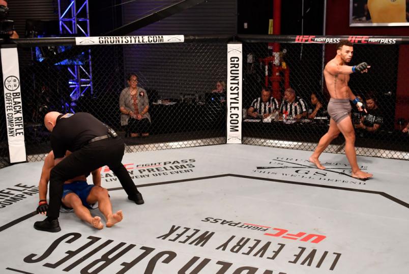 LAS VEGAS, NV - JUNE 26: Te Edwards celebrates after knocking out Austin Tweedy in their lightweight bout during Dana White's Tuesday Night Contender Series at the TUF Gym on June 26, 2018 in Las Vegas, Nevada. (Photo by Jeff Bottari/DWTNCS LLC)