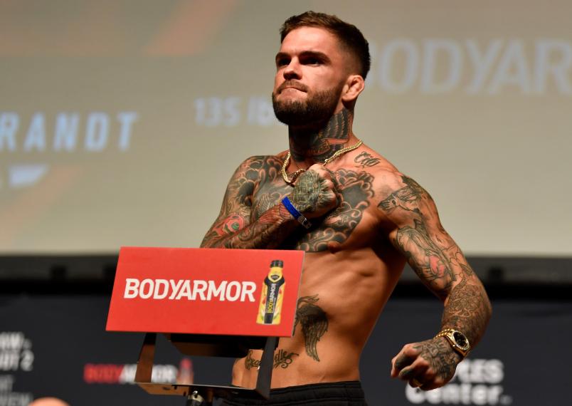 LOS ANGELES, CA - AUGUST 03: Cody Garbrandt poses on the scale during the UFC 227 weigh-in inside the Orpheum Theater on August 3, 2018 in Los Angeles, California. (Photo by Jeff Bottari/Zuffa LLC/Zuffa LLC via Getty Images)