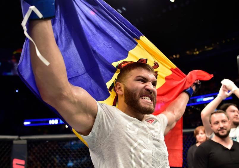 CALGARY, AB - JULY 28: Ion Cutelaba of the Republic of Moldova celebrates after his victory over Gadzhimurad Antigulov in their light heavyweight bout during the UFC Fight Night event at Scotiabank Saddledome on July 28, 2018 in Calgary, Alberta, Canada. (Photo by Jeff Bottari/Zuffa LLC/Zuffa LLC via Getty Images)