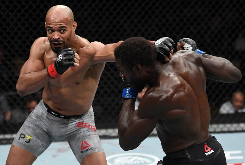 NEW YORK, NY - NOVEMBER 03: (L-R) David Branch punches Jared Cannonier in their middleweight bout during the UFC 230 event inside Madison Square Garden on November 3, 2018 in New York, New York. (Photo by Jeff Bottari/Zuffa LLC/Zuffa LLC via Getty Images)