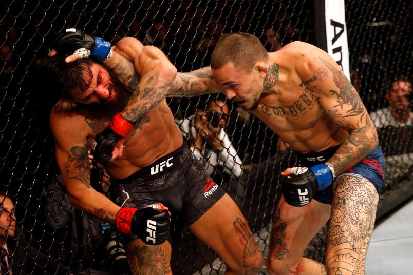 BUENOS AIRES, ARGENTINA - NOVEMBER 17: (R-L) Marlon Vera of Ecuador punches Guido Cannetti of Argentina in their bantamweight bout during the UFC Fight Night event inside Arena Parque Roca on November 17, 2018 in Buenos Aires, Argentina. (Photo by Alexandre Schneider/Zuffa LLC/Zuffa LLC via Getty Images)