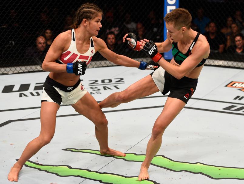 ATLANTA, GA - JULY 30: (R-L) Rose Namajunas kicks Karolina Kowalkiewicz in their women's strawweight bout during the UFC 201 event on July 30, 2016 at Philips Arena in Atlanta, Georgia. (Photo by Jeff Bottari/Zuffa LLC/Zuffa LLC via Getty Images)