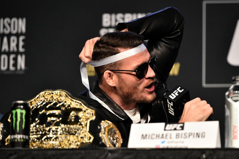 NEW YORK, NY - NOVEMBER 02: UFC Middleweight Champion Michael Bisping of England interacts with his opponent Georges St-Pierre of Canada (not pictured) during the UFC 217 Press Conference inside Madison Square Garden on November 2, 2017 in New York City. (Photo by Jeff Bottari/Zuffa LLC/Zuffa LLC via Getty Images)