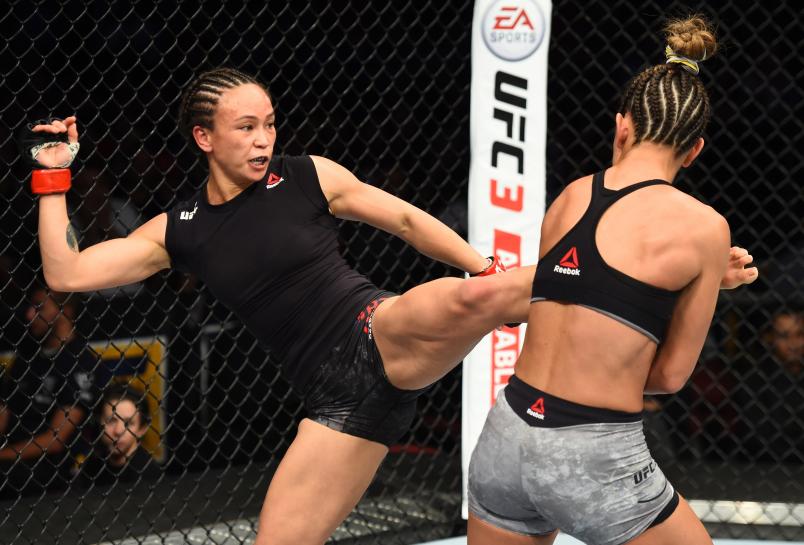 GLENDALE, AZ - APRIL 14: (L-R) Michelle Waterson kicks Cortney Casey in their womens strawweight fight during the UFC Fight Night event at the Gila Rivera Arena on April 14, 2018 in Glendale, Arizona. (Photo by Josh Hedges/Zuffa LLC/Zuffa LLC via Getty Images)