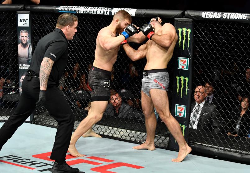CALGARY, AB - JULY 28: (R-L) Gadzhimurad Antigulov of Russia punches Ion Cutelaba of the Republic of Moldova in their light heavyweight bout during the UFC Fight Night event at Scotiabank Saddledome on July 28, 2018 in Calgary, Alberta, Canada. (Photo by Jeff Bottari/Zuffa LLC/Zuffa LLC via Getty Images)