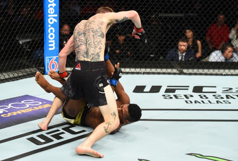 LINCOLN, NE - AUGUST 25: (L-R) Cory Sandhagen punches Iuri Alcantara of Brazil in their bantamweight fight during the UFC Fight Night event at Pinnacle Bank Arena on August 25, 2018 in Lincoln, Nebraska. (Photo by Josh Hedges/Zuffa LLC/Zuffa LLC via Getty Images)