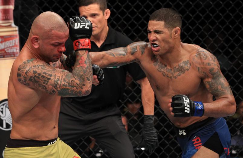 FORTALEZA, BRAZIL - FEBRUARY 02: (R-L) Max Griffin punches Thiago Alves of Brazil in their welterweight fight during the UFC Fight Night event at CFO Centro de Formacao Olimpica on February 2, 2019 in Fortaleza, Brazil. (Photo by Buda Mendes/Zuffa LLC/Zuffa LLC via Getty Images)