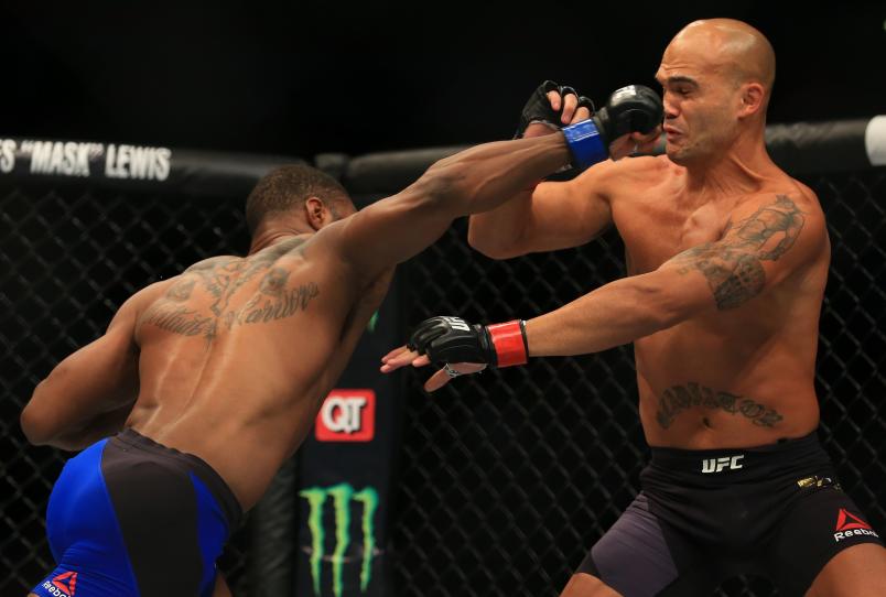 ATLANTA, GA - JULY 30: (L-R) Tyron Woodley delivers a right hand to knock down opponent Robbie Lawler in their welterweight championship bout during the UFC 201 event on July 30, 2016 at Philips Arena in Atlanta, Georgia. (Photo by Daniel Shirey/Zuffa LLC/Zuffa LLC via Getty Images)