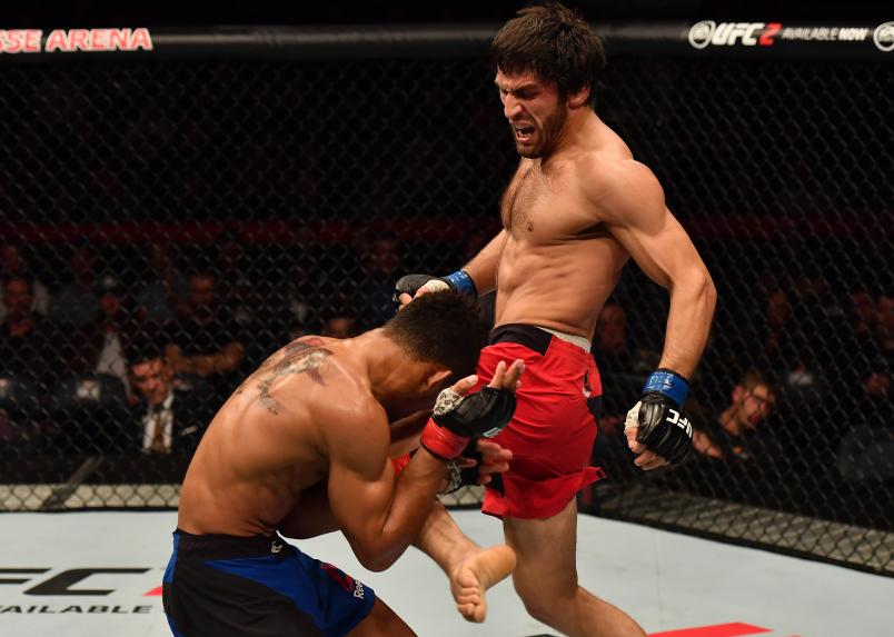 BELFAST, NORTHERN IRELAND - NOVEMBER 19: (R-L) Magomed Mustafaev of Russia knees Kevin Lee in their lightweight bout during the UFC Fight Night at the SSE Arena on November 19, 2016 in Belfast, Northern Ireland. (Photo by Brandon Magnus/Zuffa LLC/Zuffa LLC via Getty Images)