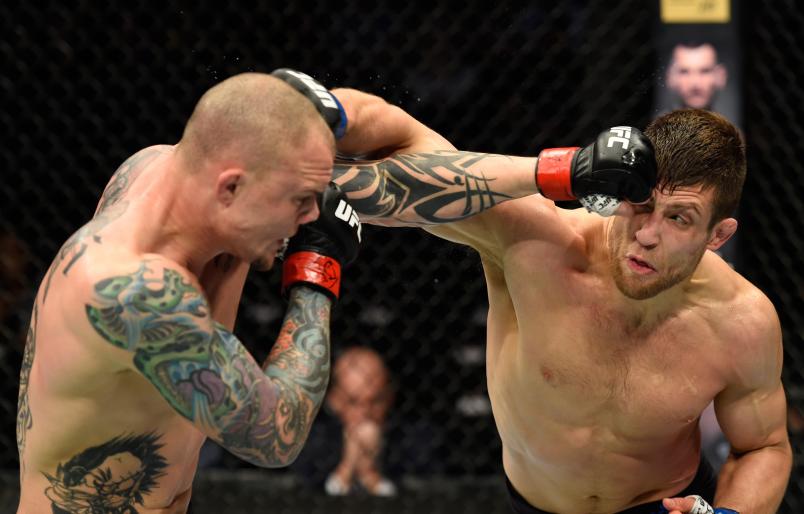 KANSAS CITY, MO - APRIL 15: (R-L) Andrew Sanchez exchanges punches with Anthony Smith in their middleweight fight during the UFC Fight Night event at Sprint Center on April 15, 2017 in Kansas City, Missouri. (Photo by Josh Hedges/Zuffa LLC/Zuffa LLC via Getty Images)