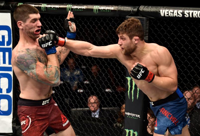 LAS VEGAS, NV - DECEMBER 01: (R-L) Andrew Sanchez punches Ryan Janes of Canada in their middleweight bout during the TUF Finale event inside Park Theater on December 01, 2017 in Las Vegas, Nevada. (Photo by Jeff Bottari/Zuffa LLC/Zuffa LLC via Getty Images)
