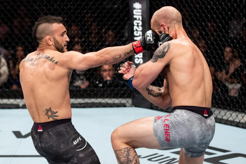 RIO DE JANEIRO, BRAZIL - MAY 12: John Lineker ( L) of the Brazil punches Brian Kelleher of the United States in their bantamweight bout during the UFC 224 event at Jeunesse Arena on May 12, 2018 in Rio de Janeiro, Brazil. (Photo by Buda Mendes/Zuffa LLC/Zuffa LLC)