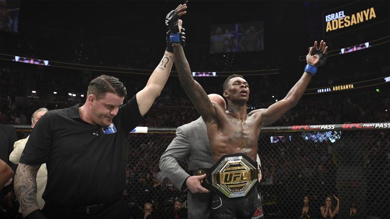 ATLANTA, GA - APRIL 13: (L-R) UFC President Dana White places the interim middleweight championship belt on Israel Adesanya after defeating Kelvin Gastelum by unanimous decision in their interim middleweight championship bout during the UFC 236 event at State Farm Arena on April 13, 2019 in Atlanta, Georgia. (Photo by Josh Hedges/Zuffa LLC/Zuffa LLC via Getty Images)