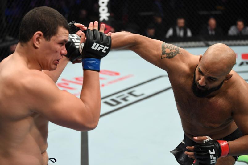 MONCTON, NB - OCTOBER 27: (R-L) Arjan Singh Bhullar of Canada punches Marcelo Golm of Brazil in their heavyweight bout during the UFC Fight Night event inside Avenir Centre on October 27, 2018 in Moncton, New Brunswick, Canada. (Photo by Jeff Bottari/Zuffa LLC/Zuffa LLC via Getty Images)
