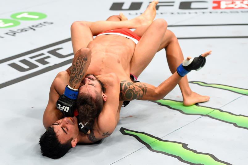 BERLIN, GERMANY - JUNE 20: (L-R) Makwan Amirkhani of Finland attempts a submission against Masio Fullen of Mexico in their featherweight bout during the UFC Fight Night event at the O2 World on June 20, 2015 in Berlin, Germany. (Photo by Josh Hedges/Zuffa LLC/Zuffa LLC via Getty Images)