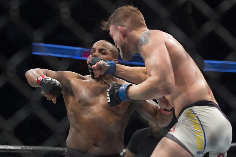HOUSTON, TX - OCTOBER 3: Alexander Gustafsson connects with a punch against Daniel Cormier during UFC 192 at the Toyota Center on October 3, 2015 in Houston, Texas. (Photo by Cooper Neill/Zuffa LLC/Zuffa LLC via Getty Images)