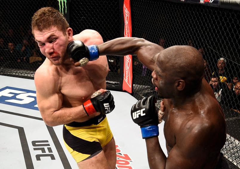 LAS VEGAS, NV - DECEMBER 03: (R-L) Jared Cannonier punches Ion Cutelaba of Moldova in their light heavyweight bout during The Ultimate Fighter Finale event inside the Pearl concert theater at the Palms Resort & Casino on December 3, 2016 in Las Vegas, Nevada. (Photo by Jeff Bottari/Zuffa LLC/Zuffa LLC via Getty Images)