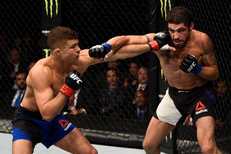 NASHVILLE, TN - APRIL 22: (R-L) Diego Sanchez punches Al Iaquinta in their lightweight bout during the UFC Fight Night event at Bridgestone Arena on April 22, 2017 in Nashville, Tennessee. (Photo by Jeff Bottari/Zuffa LLC/Zuffa LLC via Getty Images)