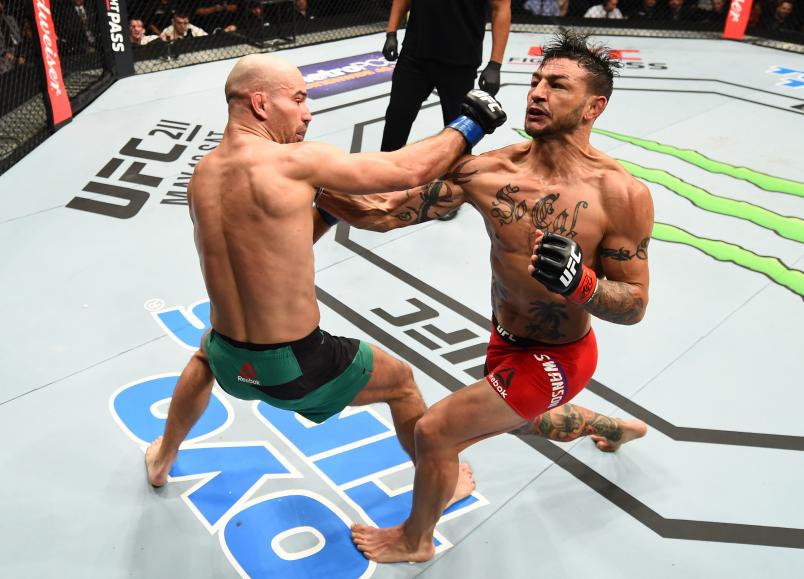 NASHVILLE, TN - APRIL 22: (R-L) Cub Swanson punches Artem Lobov of Russia in their featherweight bout during the UFC Fight Night event at Bridgestone Arena on April 22, 2017 in Nashville, Tennessee. (Photo by Jeff Bottari/Zuffa LLC/Zuffa LLC via Getty Images)