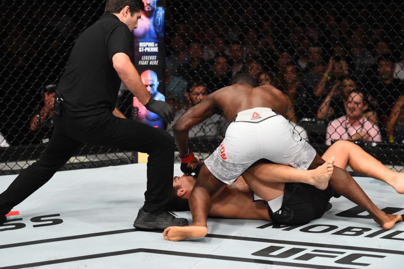 SAO PAULO, BRAZIL - OCTOBER 28: (R-L) Derek Brunson punches Lyoto Machida of Brazil in their middleweight bout during the UFC Fight Night event inside the Ibirapuera Gymnasium on October 28, 2017 in Sao Paulo, Brazil. (Photo by Josh Hedges/Zuffa LLC/Zuffa LLC via Getty Images)