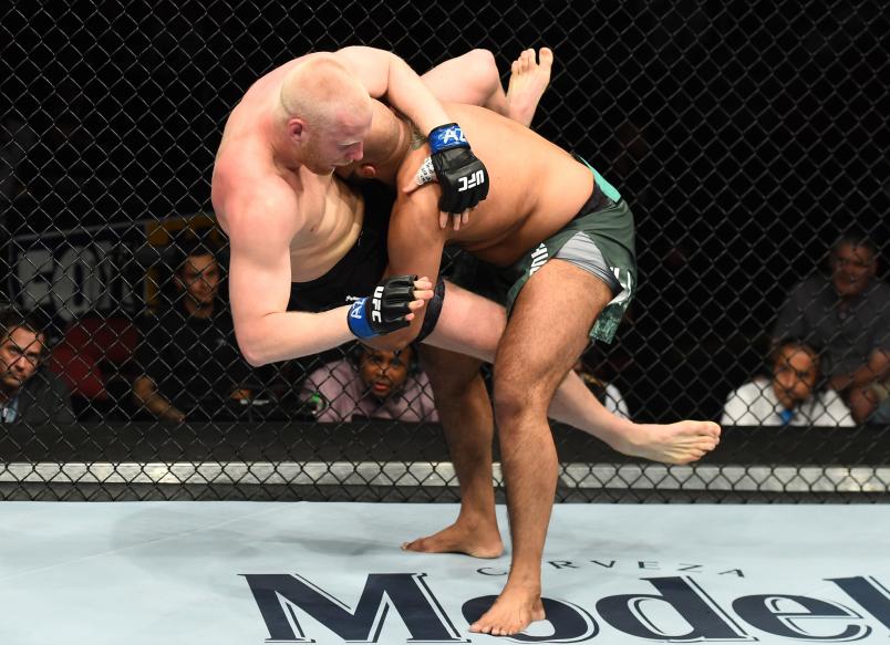 GLENDALE, AZ - APRIL 14: (R-L) Arjan Singh Bhullar of Canada takes down Adam Wieczorek of Poland in their heavyweight fight during the UFC Fight Night event at the Gila Rivera Arena on April 14, 2018 in Glendale, Arizona. (Photo by Josh Hedges/Zuffa LLC/Zuffa LLC via Getty Images)