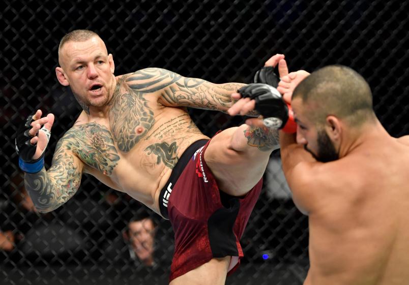 CALGARY, AB - JULY 28: (L-R) Ross Pearson of England kicks John Makdessi of Canada in their lightweight bout during the UFC Fight Night event at Scotiabank Saddledome on July 28, 2018 in Calgary, Alberta, Canada. (Photo by Jeff Bottari/Zuffa LLC/Zuffa LLC via Getty Images)