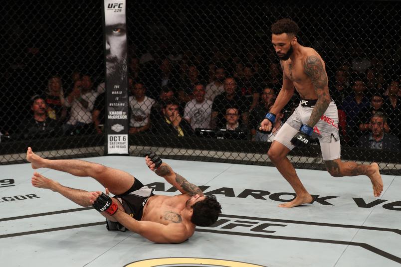 SAO PAULO, BRAZIL - SEPTEMBER 22: (L-R) Renan Barao of Brazil gets knocked down by Andre Ewell in their bantamweight bout during the UFC Fight Night event at Ibirapuera Gymnasium on September 22, 2018 in Sao Paulo, Brazil. (Photo by Buda Mendes/Zuffa LLC/Zuffa LLC via Getty Images)