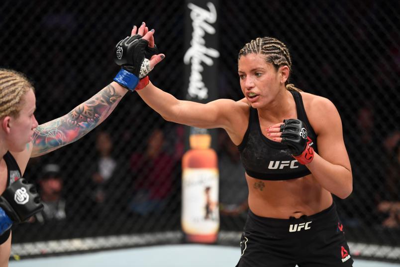 DENVER, CO - NOVEMBER 10: (R-L) Ashley Yoder and Amanda Cooper touch gloves to the start of round two in their women's strawweight bout during the UFC Fight Night event inside Pepsi Center on November 10, 2018 in Denver, Colorado. (Photo by Josh Hedges/Zuffa LLC/Zuffa LLC via Getty Images)