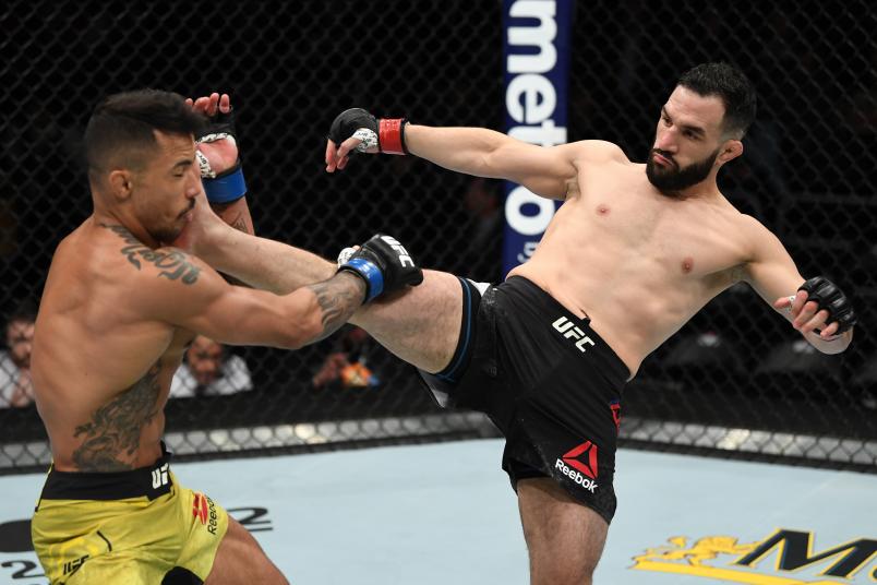 MILWAUKEE, WISCONSIN - DECEMBER 15: (R-L) Jared Gordon kicks Joaquim Silva of Brazil in their lightweight bout during the UFC Fight Night event at Fiserv Forum on December 15, 2018 in Milwaukee, Wisconsin. (Photo by Jeff Bottari/Zuffa LLC/Zuffa LLC via Getty Images)