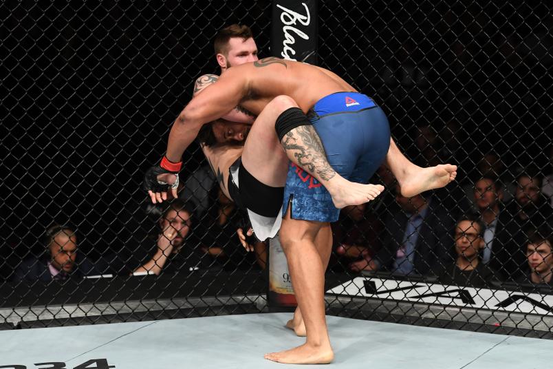 NEW YORK, NY - JANUARY 19: (L-R) Allen Crowder attempts to submit Greg Hardy in their heavyweight bout during the UFC Fight Night event at the Barclays Center on January 19, 2019 in the Brooklyn borough of New York City. (Photo by Josh Hedges/Zuffa LLC/Zuffa LLC via Getty Images)