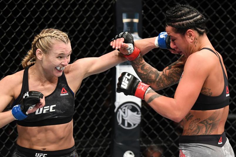 PHOENIX, ARIZONA - FEBRUARY 17: (L-R) Andrea Lee punches Ashlee Evans-Smith in their women's flyweight bout during the UFC Fight Night event at Talking Stick Resort Arena on February 17, 2019 in Phoenix, Arizona. (Photo by Josh Hedges/Zuffa LLC/Zuffa LLC via Getty Images)