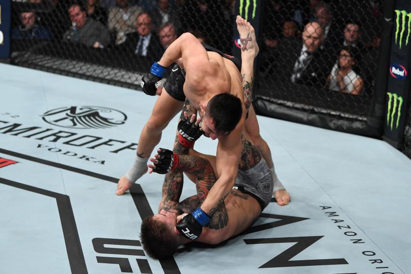 LAS VEGAS, NV - MARCH 02: Pedro Munhoz of Brazil punches Cody Garbrandt in their bantamweight bout during the UFC 235 event at T-Mobile Arena on March 2, 2019 in Las Vegas, Nevada. (Photo by Jeff Bottari/Zuffa LLC/Zuffa LLC)