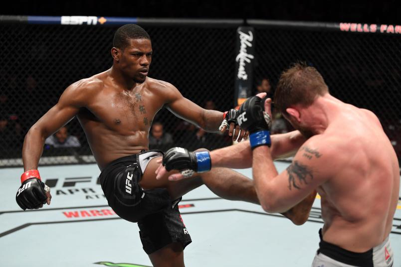 PHILADELPHIA, PA - MARCH 30: (L-R) Kevin Holland kicks Gerald Meerschaert in their middleweight bout during the UFC Fight Night event at Wells Fargo Center on March 30, 2019 in Philadelphia, Pennsylvania. (Photo by Josh Hedges/Zuffa LLC/Zuffa LLC via Getty Images)