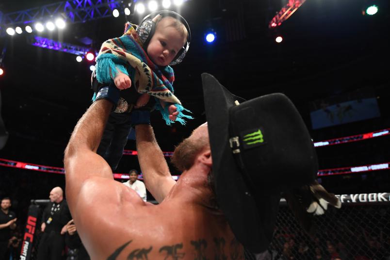 OTTAWA, ON - MAY 04: Donald Cerrone celebrates with his son Dacson Danger Cerrone after his victory over Al Iaquinta during the UFC Fight Night event at Canadian Tire Centre on May 4, 2019 in Ottawa, Ontario, Canada. (Photo by Jeff Bottari/Zuffa LLC/Zuffa LLC via Getty Images)