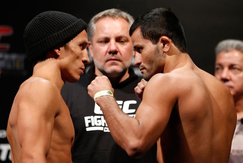 BELO HORIZONTE, BRAZIL - SEPTEMBER 03: (L-R) Opponents Joseph Benavidez and Jussier Formiga face off during the UFC weigh-in event at Mineirinho Arena on September 3, 2013 in Belo Horizonte, Brazil. (Photo by Josh Hedges/Zuffa LLC/Zuffa LLC via Getty Images)