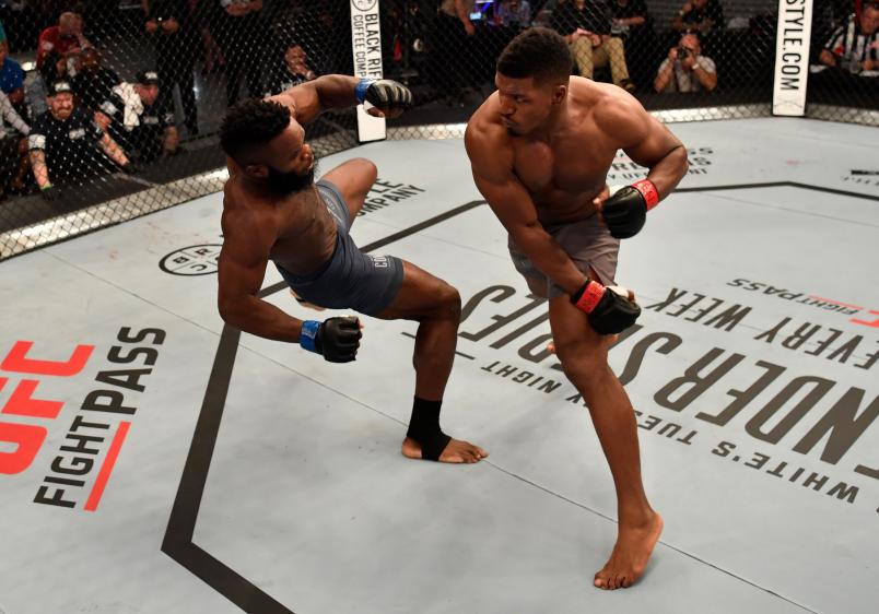 LAS VEGAS, NV - JUNE 12: (R-L) Alonzo Menifield punches Dashawn Boatwright in their light heavyweight bout during Dana White's Tuesday Night Contender Series at the TUF Gym on June 12, 2018 in Las Vegas, Nevada. (Photo by Jeff Bottari/DWTNCS LLC)