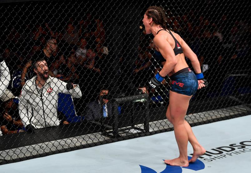 SINGAPORE - JUNE 23: Jessica Eye celebrates after her decision victory over Jessica-Rose Clark of Australia in their women's flyweight bout during the UFC Fight Night event at the Singapore Indoor Stadium on June 23, 2018 in Singapore. (Photo by Jeff Bottari/Zuffa LLC/Zuffa LLC via Getty Images)