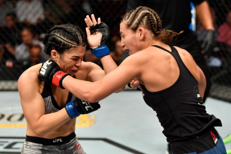 LAS VEGAS, NV - JULY 06: (R-L) Montana De La Rosa punches Rachael Ostovich in their women's flyweight bout during The Ultimate Fighter Finale event inside The Pearl concert theater at Palms Casino Resort on July 6, 2018 in Las Vegas, Nevada. (Photo by Jeff Bottari/Zuffa LLC/Zuffa LLC via Getty Images)