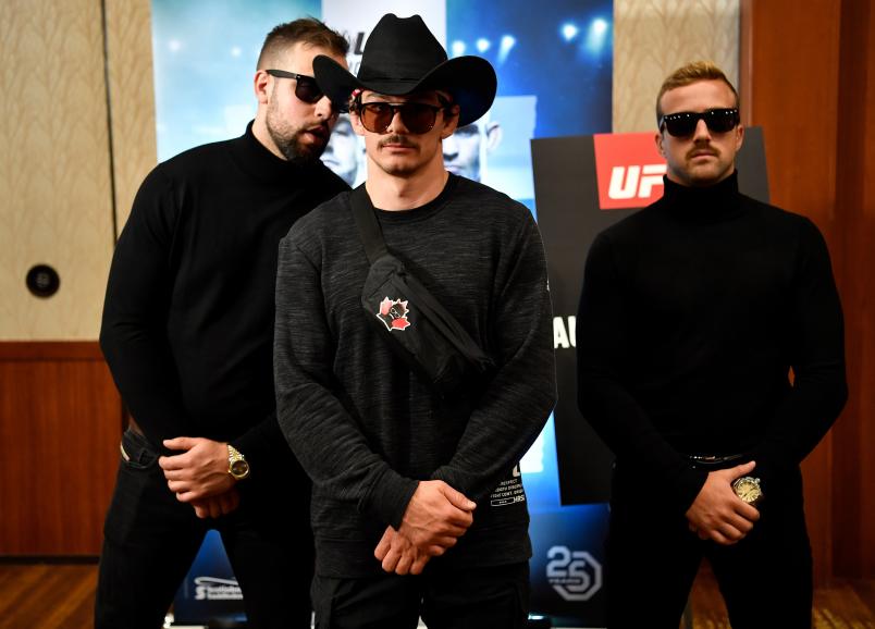 CALGARY, AB - JULY 26: Olivier Aubin-Mercier of Canada poses with his body guards during the UFC Fight Night Ultimate Media Day event at Hyatt Regency Calgary on July 26, 2018 in Calgary, Alberta, Canada. (Photo by Jeff Bottari/Zuffa LLC/Zuffa LLC via Getty Images)