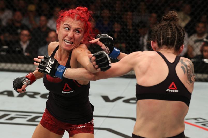 SAO PAULO, BRAZIL - SEPTEMBER 22: (L-R) Randa Markos of Iraq punches Marina Rodriguez of Brazil in their women's strawweight bout during the UFC Fight Night event at Ibirapuera Gymnasium on September 22, 2018 in Sao Paulo, Brazil. (Photo by Buda Mendes/Zuffa LLC/Zuffa LLC via Getty Images)