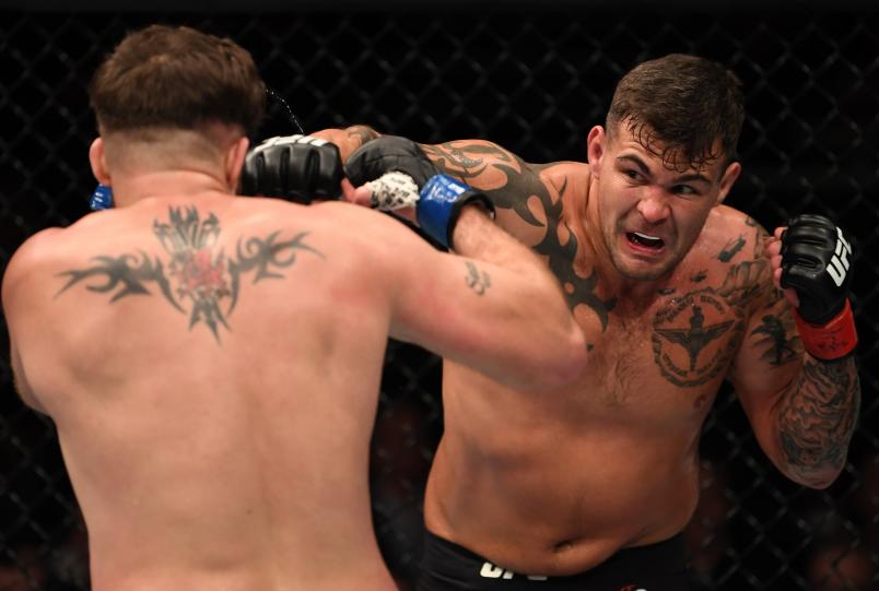 LONDON, ENGLAND - MARCH 16: (R-L) Jack Marshman of Wales punches John Phillips of Wales in their middleweight bout during the UFC Fight Night event at The O2 Arena on March 16, 2019 in London, England. (Photo by Jeff Bottari/Zuffa LLC/Zuffa LLC via Getty Images)